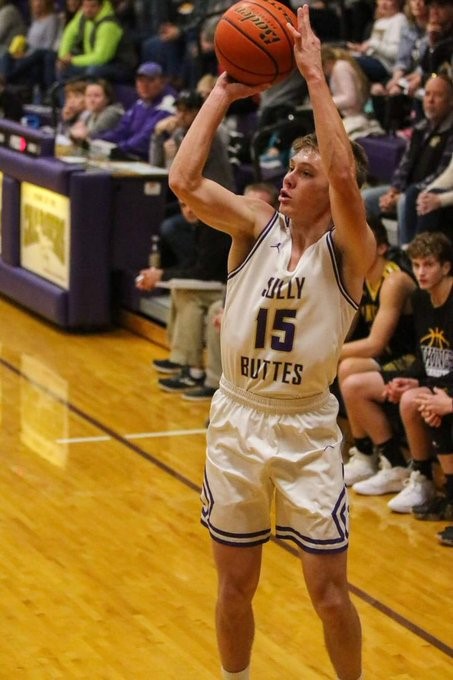 Nick Wittler of Sully Buttes shooting a basketball